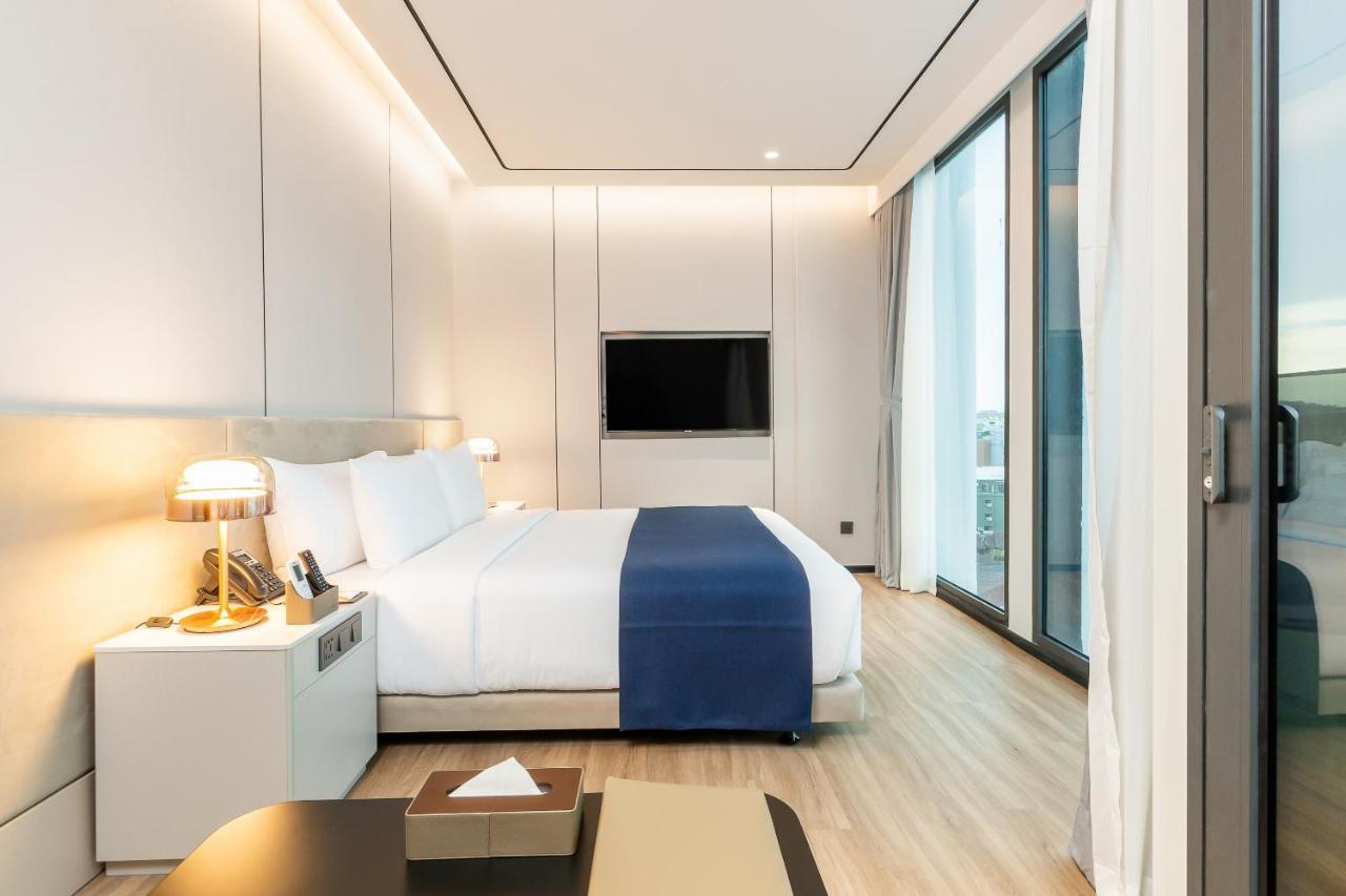 Arbour Hotel And Residence باتايا المظهر الخارجي الصورة A bedroom at the hotel